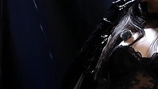 Sexy Russian Brunette Smoking in Black Lace Gloves