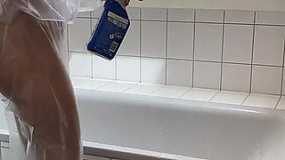 Sue, Cleaning the Bathroom in a Pvc Suit!