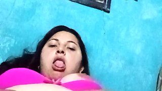 Chubby Latina with big tits chews her rich wet pussy