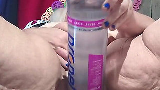 Big Bottle Plugged Clit Cunt