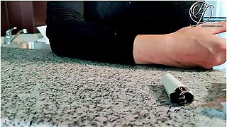 MILF secretary teases with a cigarette at work