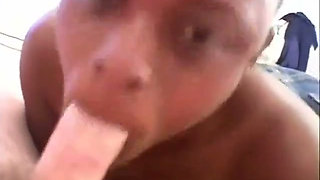 Ebony with big rack gives blowjob