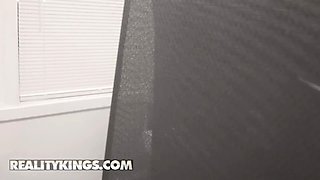 Reality kings - sexy coworker Kira Noir titty-fucks van under the desk before gliding his cock inwards her cunt