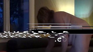 Mature Helene by the Window