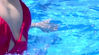 Lesbian Girls Are Having Fun in a Pool with an Inflatable Shark