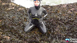Rubbery Beach Encounter: Lucy's Neoprene Pussy Play with Stranger