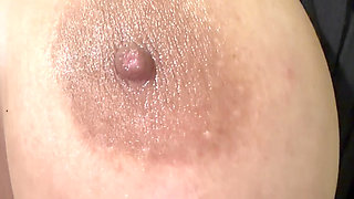 Hot mom massages her huge tits all full of oil