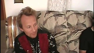 Slutty vixen is sucking cock when getting fucked at the same time
