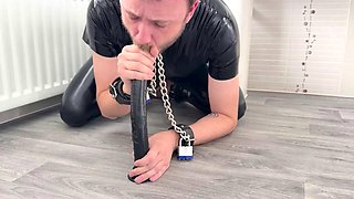 Sucking dildo in chastity and masturbation