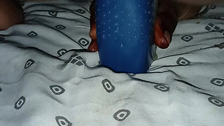 Inserting the bottle deep into the