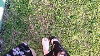 Walking with My Feet on the Grass and Showing Them to You up Close