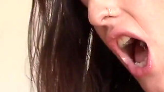 Ebony and brunette lick each other