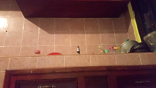 Chubby mom in the kitchen showing thong