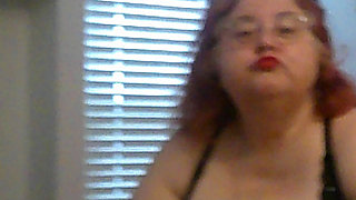 Mature BBW Redhead Nurse Vicki Talks to You as She Makes a Lipstick Applying Video for You!