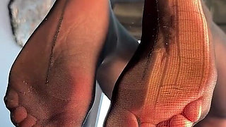 Watch Me Tease You with My Ripped Nylon Feet Through the Glass