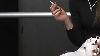 Mistress Evangelie Gets Her Shoes Cleaned and Smokes