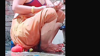 The village woman bathes in the open, undresses, entices everyone