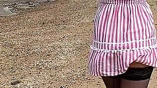 Stripping Naked Out of Mini Dress on Beach