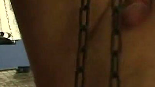 Humiliated chaining and penis squeezing