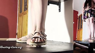 Light femdom and foot fetish play with brunette