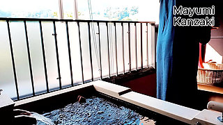 A Married Woman Taking a Bath in a Hotel Room