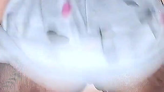 Katty Milk Playing with and Shaking Her Huge Tits in Front of the Camera.