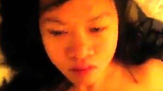 Amateur Asian Girl Gives Blowjob