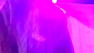 Smoking a Cigarette Outdoor While Wearing Only a Bikini and a Jacket