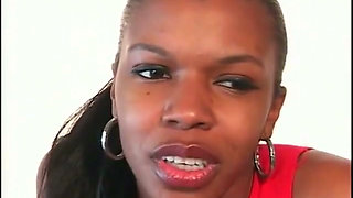 A black girl is on her knees sucking a cock and being fucked