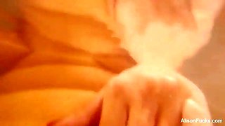Buxom Alison Tyler takes a bath