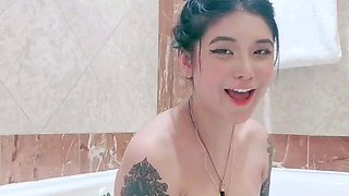 Busty babe playing with her big boobs
