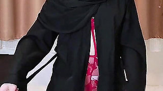 A Naughty Malaysian Hijabi Girl Doing Porn Showing off Her Ass in Abaya