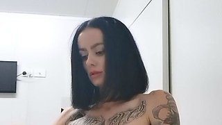 Busty curly brunette with big boobs fucks on couch