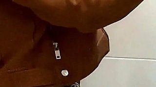 Busty Blonde Sucks Cock in the School Bathroom