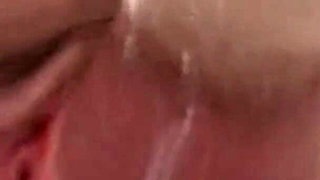 Brunette Babe Pleasures Herself with Bottle on the Couch