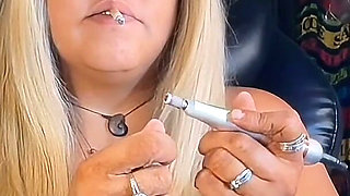 Cowboy Hat Goddess Chain Smoking Camel 100s While Doing Her Nails - Green-eyed Brazilian SSBBW with Saggy Tits